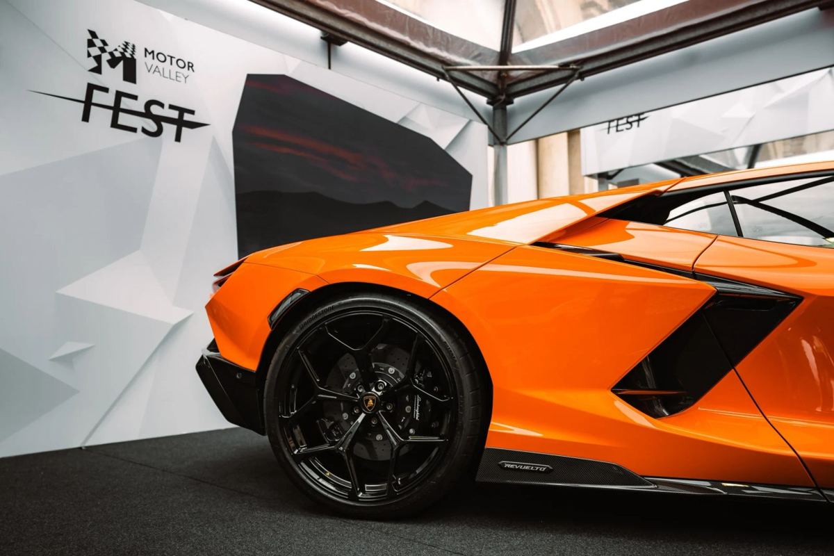 Orange Lamborghini Revuelto with a deep, glossy paint finish