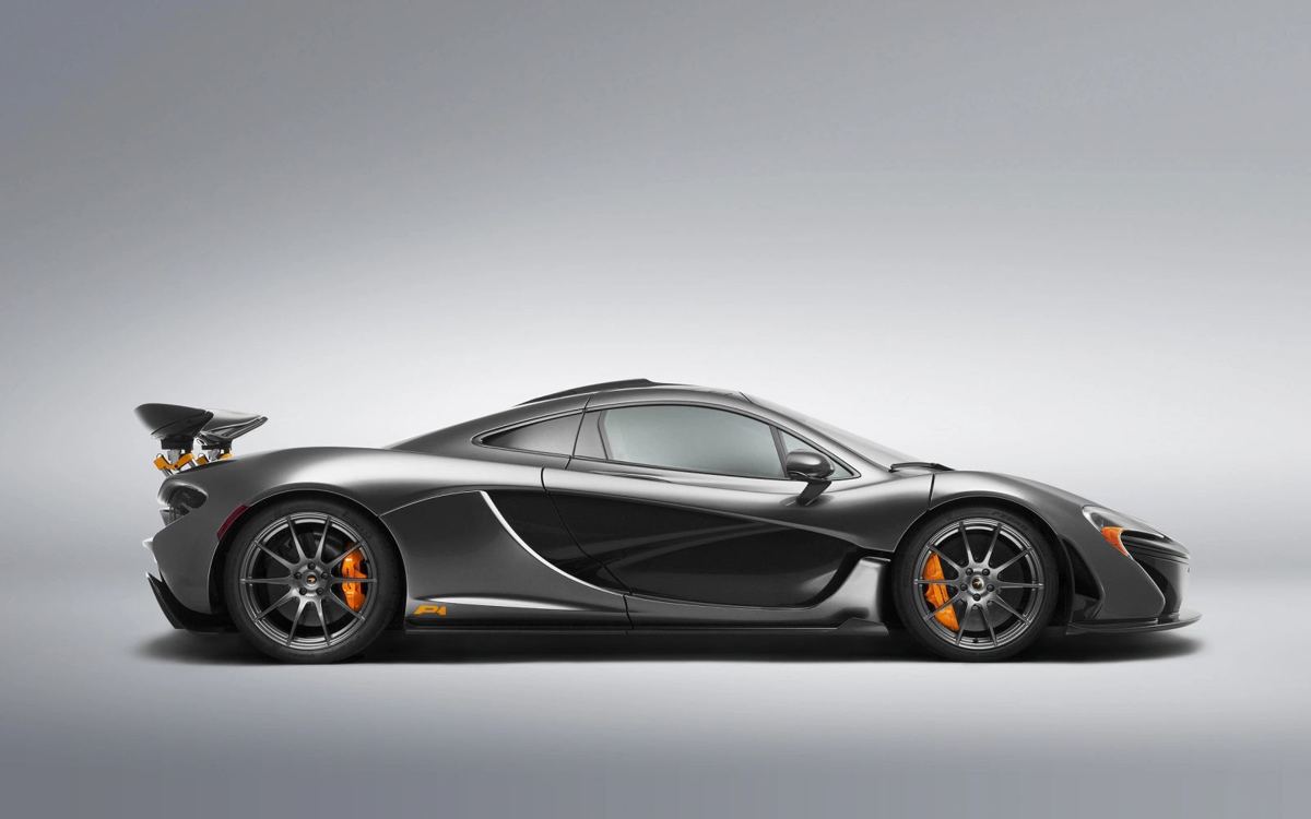 Gray McLaren P1 supercar in a studio
